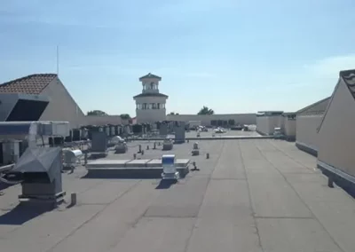 Flat commercial roof with HVAC units