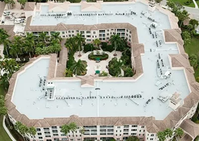 a luxury resort with a white roof in florida